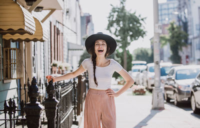 Woman standing in city