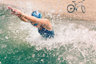 High angle view of man swimming in pool