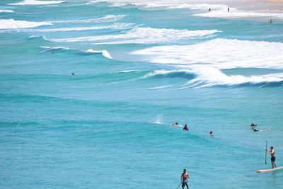 People enjoying at beach