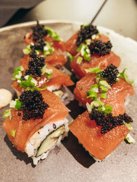 Close-up of sushi served on table