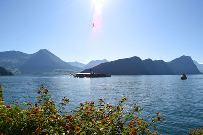 Scenic view of bay against clear sky