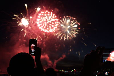 Firework display at night