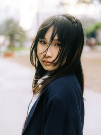 Young woman looking away