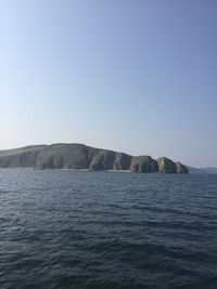 Scenic view of sea against clear sky