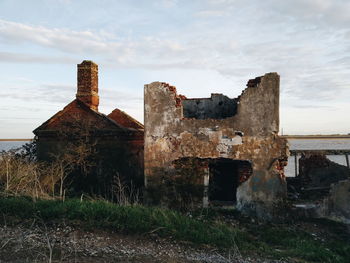 Old ruin building against sky