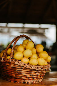 Close-up of lemons in basket