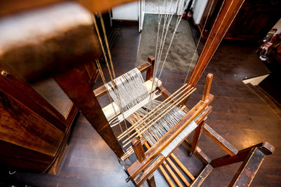 High angle view of chairs on table