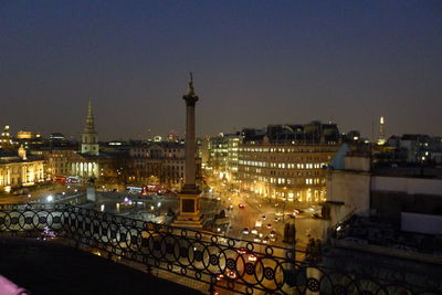 High angle view of buildings at night