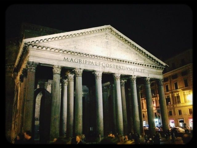 architecture, built structure, building exterior, architectural column, low angle view, history, column, facade, travel destinations, famous place, night, building, sky, outdoors, in a row, clear sky, pillar, tourism, exterior, religion