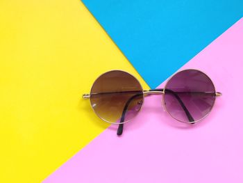 High angle view of sunglasses on swimming pool