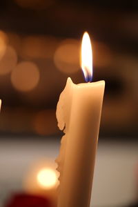 Close-up of lit candle