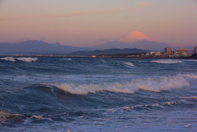 Scenic view of sea against sky during sunset