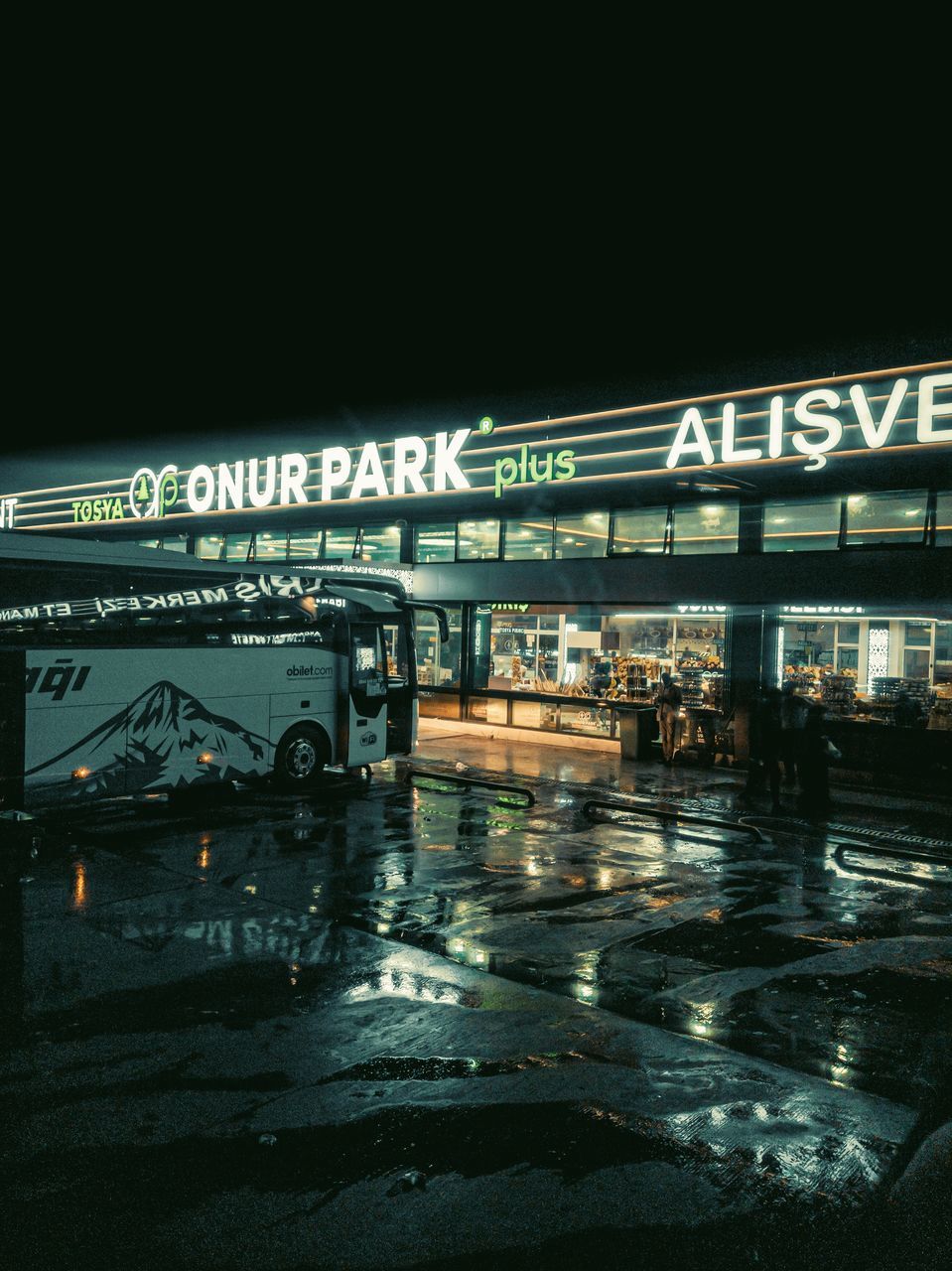 ILLUMINATED SIGN AT NIGHT