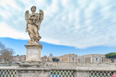 Low angle view of statue against sky