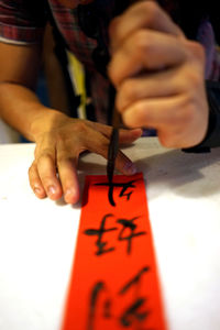 Cropped image of woman holding hands