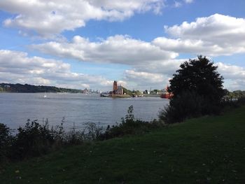 View of river against cloudy sky