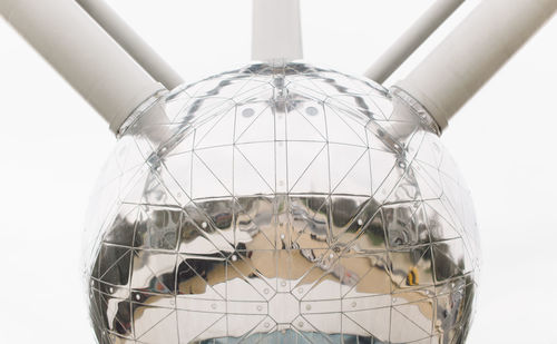 Close-up of electric lamp against clear sky