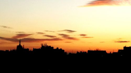 Silhouette of buildings at sunset