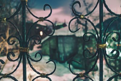 Close-up of metallic ornate gate