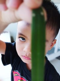 Close-up portrait of girl standing outdoors