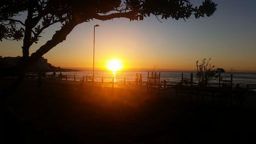 Scenic view of sea at sunset