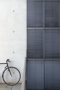 Close-up of bicycle against window
