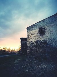 Building against sky during sunset