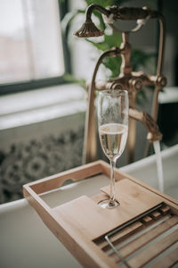 Close-up of wineglass on table