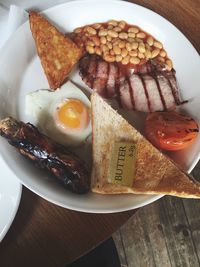 Directly above shot of breakfast served in plate on table