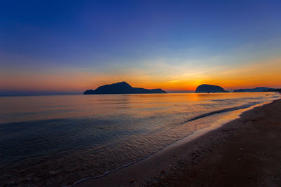 Scenic view of sea against sky during sunset