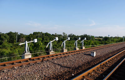 Lever wire compensator row of the railroad switch system in the station yard.