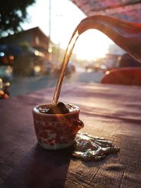 Close-up of ice cream in glass on table