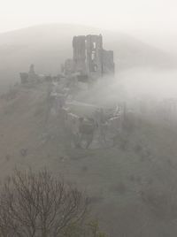 Aerial view of city during foggy weather