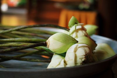 Close-up of fruits in basket on table