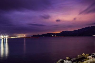 View of calm lake at sunset