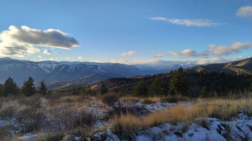 Scenic view of mountains against sky during winter