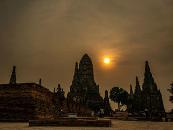 Panoramic view of temple building against sky during sunset