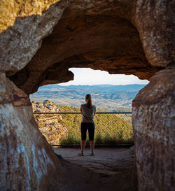 Rear view of woman looking at landscape