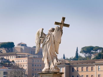 Statue of historic building against clear sky