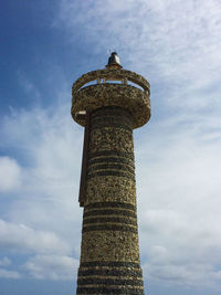 Low angle view of water tower against sky