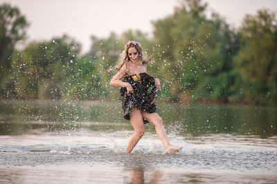 Full length of woman in water