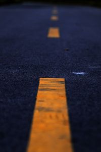 Surface level of yellow line on road