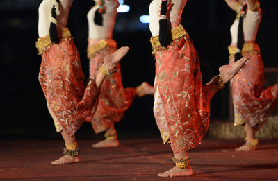 Low section of women dancing on stage