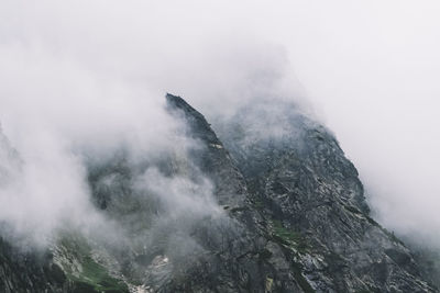 Scenic view of volcanic mountain against sky