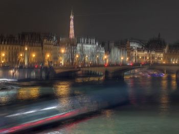 Illuminated buildings at waterfront