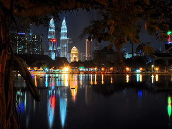 Reflection of illuminated buildings in water at night