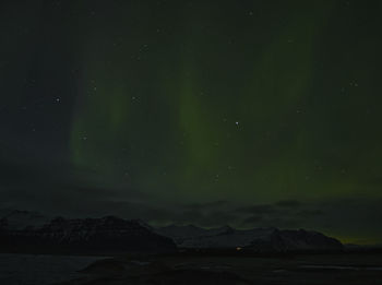 Scenic view of sea against sky at night