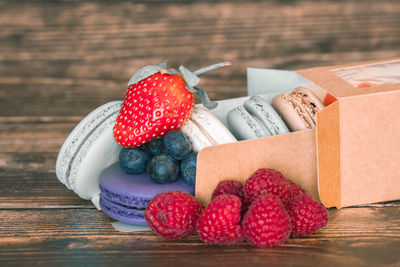 Close-up of strawberries in box on table