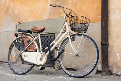 Parked bicycle at the beautiful streets of pisa