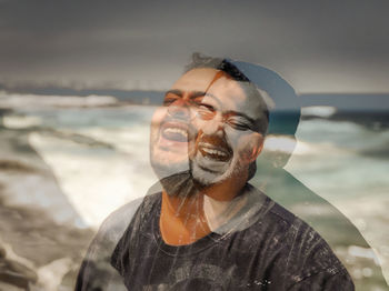 Portrait of mature man at beach